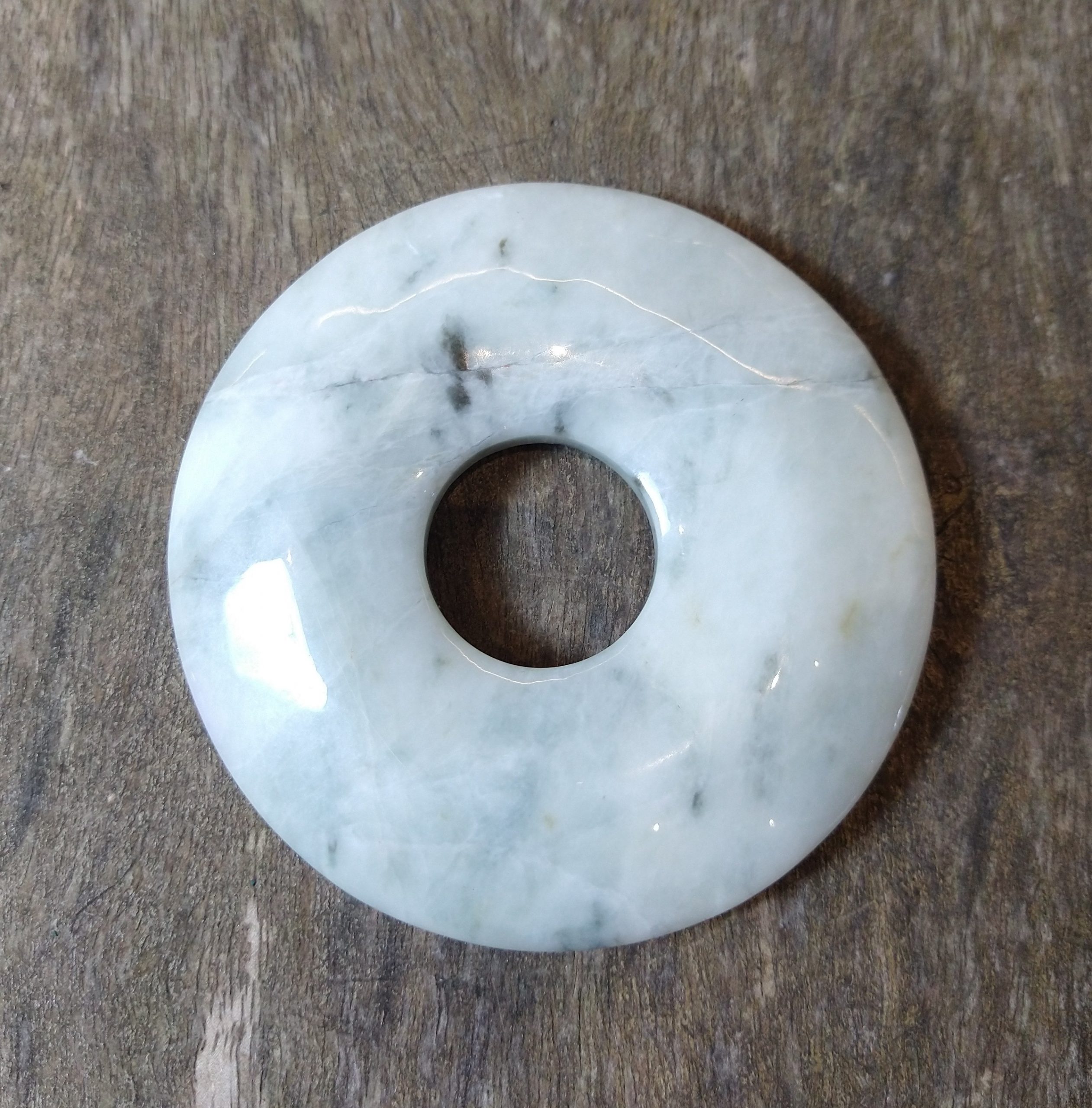 Natural Crystals: Hand Carved & Polished Jade Wheel of Life (Approx 11x1cm)