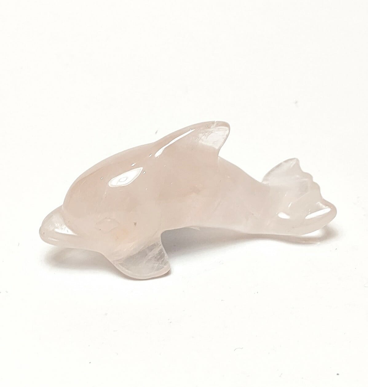 Natural crystal: Hand carved and polished Rose Quartz Dolphin (approx. 6x2cm)